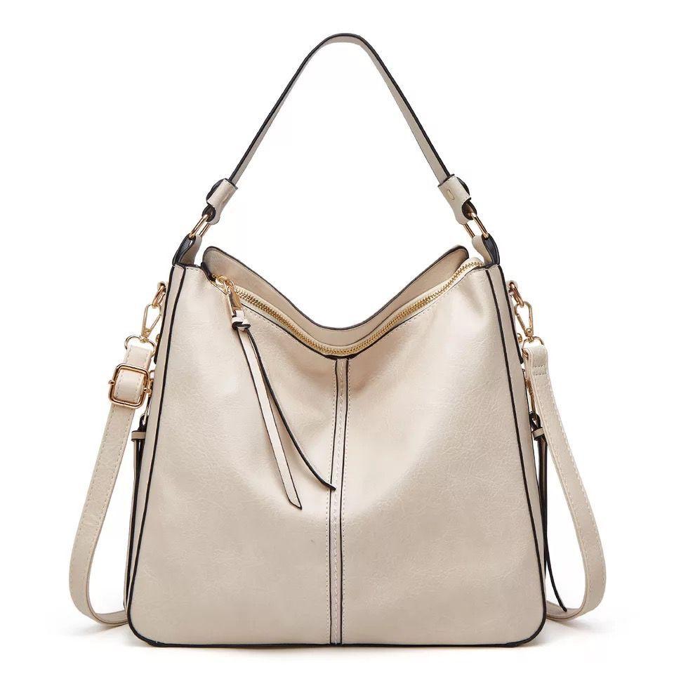 Ersilia™ - Elegant leather bag with large capacity and side pockets