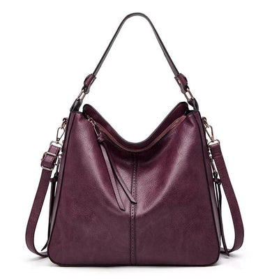 Ersilia™ - Elegant leather bag with large capacity and side pockets